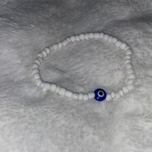 Handmade White Beaded Bracelet with Blue Evil Eye